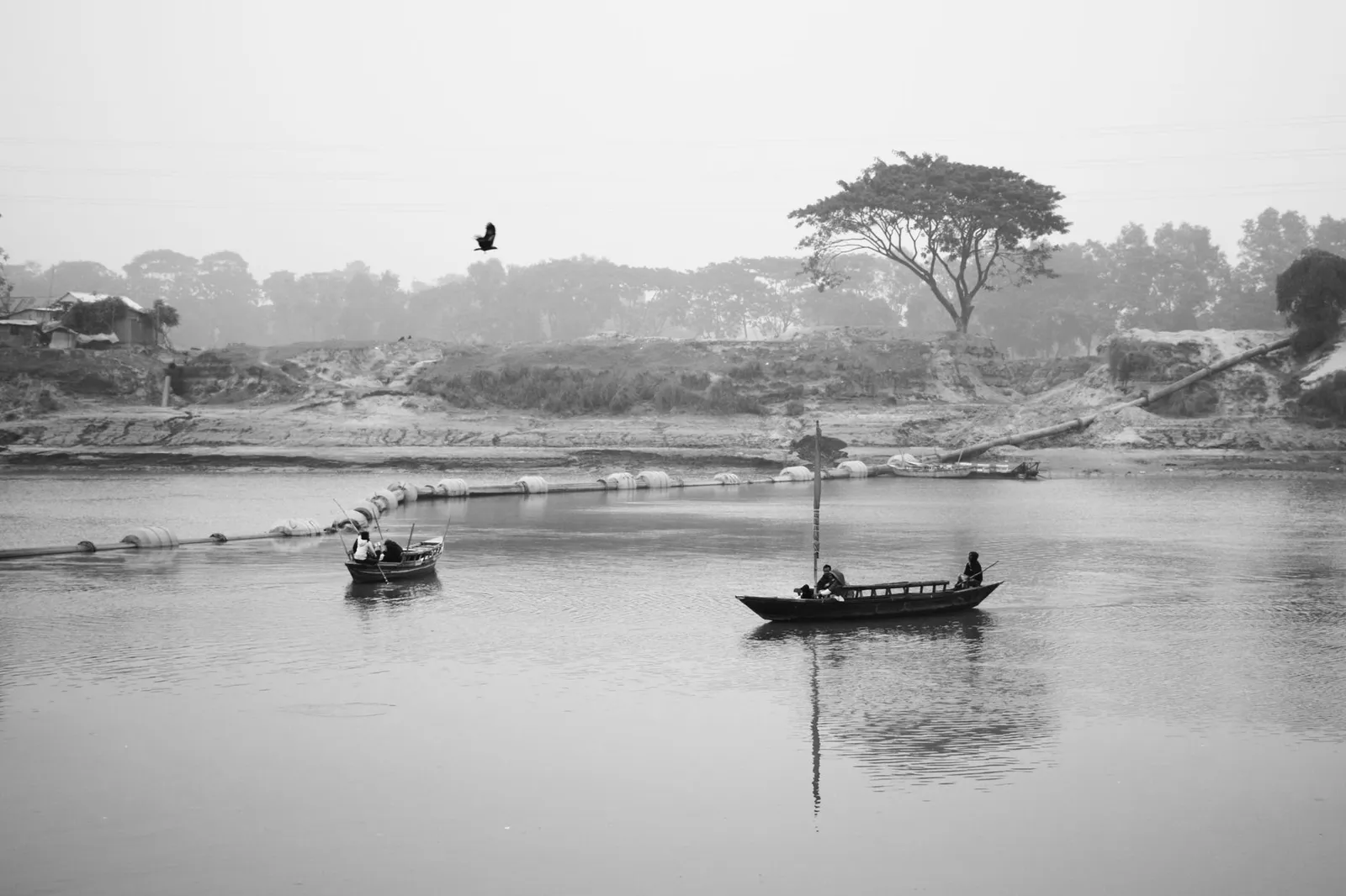 Boats on the Brahmaputra River in Mymensingh, Bangladesh — the region a remote web designer in Mymensingh builds websites for