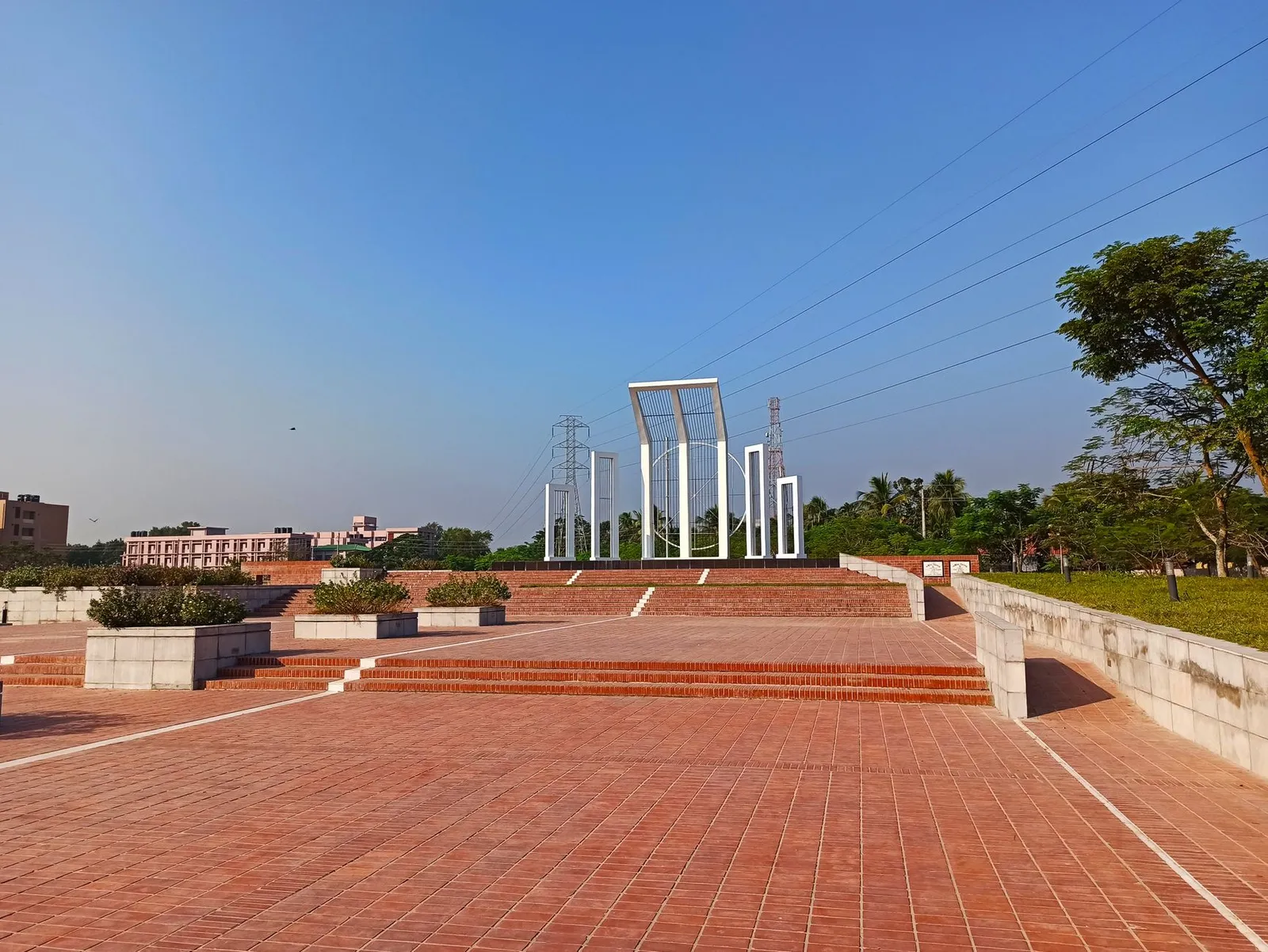 White monument and brick plaza in Khulna under a clear sky — the division an SEO expert in Khulna helps local businesses get found in
