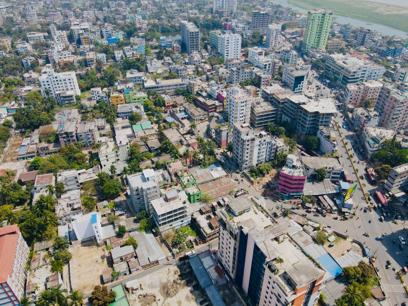 Aerial view of Rajshahi city by day, with the river in the distance — the city a remote web designer in Rajshahi builds business websites for