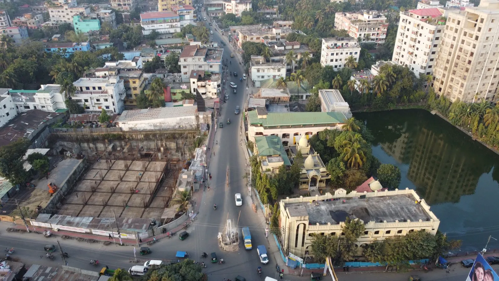 Aerial view of Sylhet city roads, buildings, and a pond — the city a remote web designer in Sylhet builds business websites for